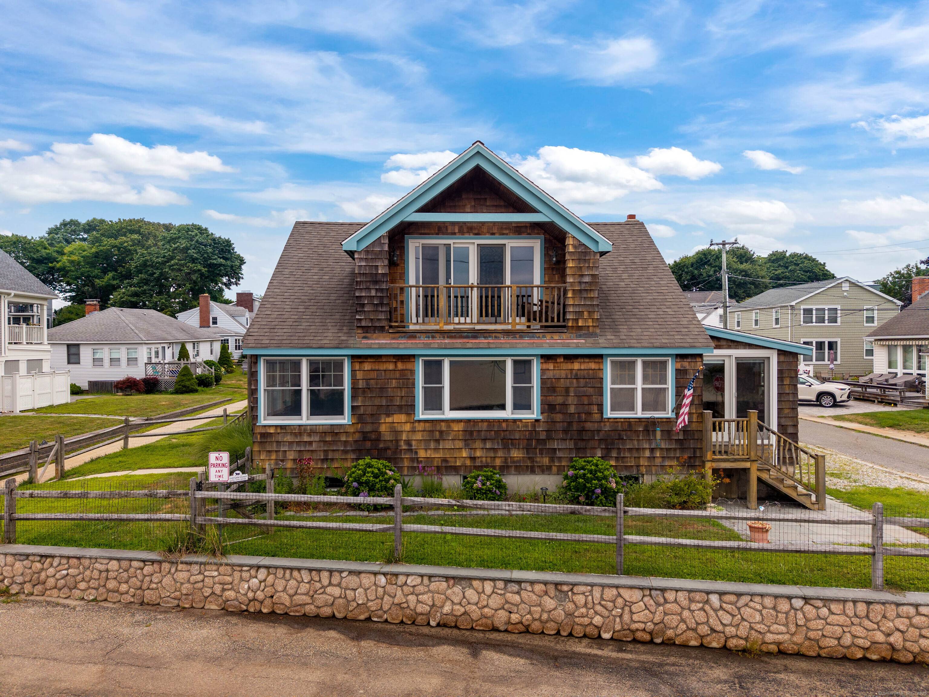Charming, rare find, water front New England Beach home.
