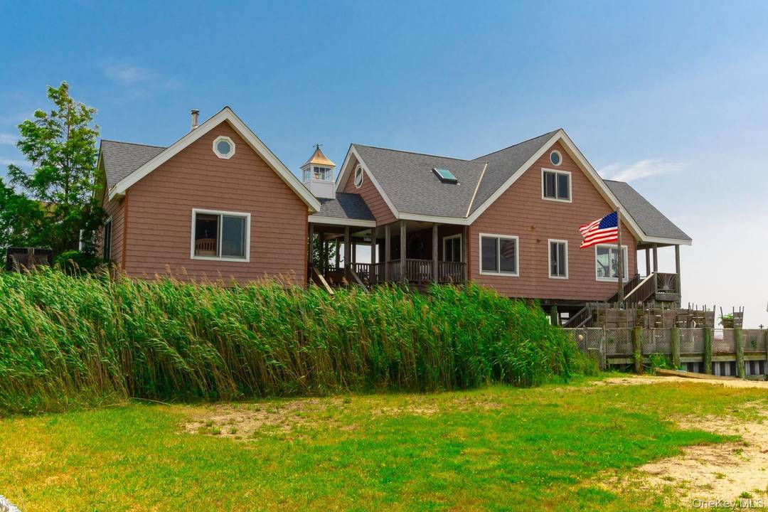 This Is Really One Of a Kind Bayfront Home With Incredible panoramic bayviews !