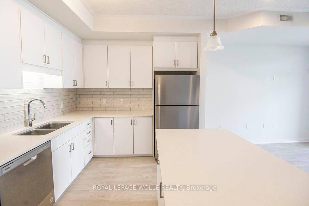 This spacious, modern townhouse features two generously sized bedrooms, two full bathrooms, and the added convenience of in suite laundry.