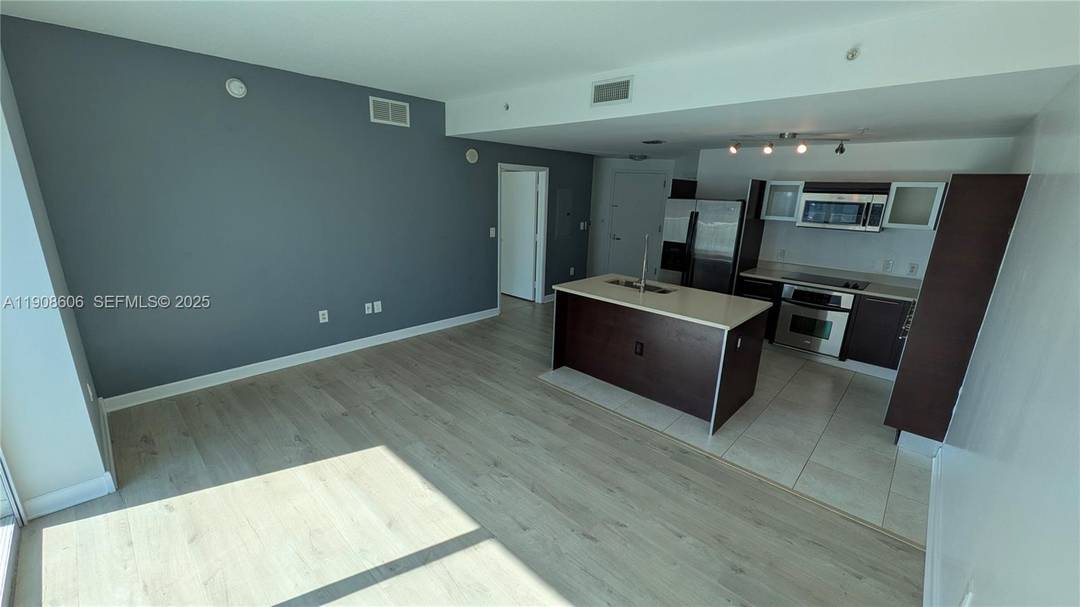 Experience Bay and Skyline views from this exquisite 1 bed, 1.