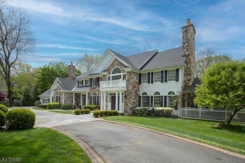 A private lifestyle property set on over two acres in Chester Township, 9 Green Hill Road presents timeless appeal in a beautifully designed Buck's County Colonial.
