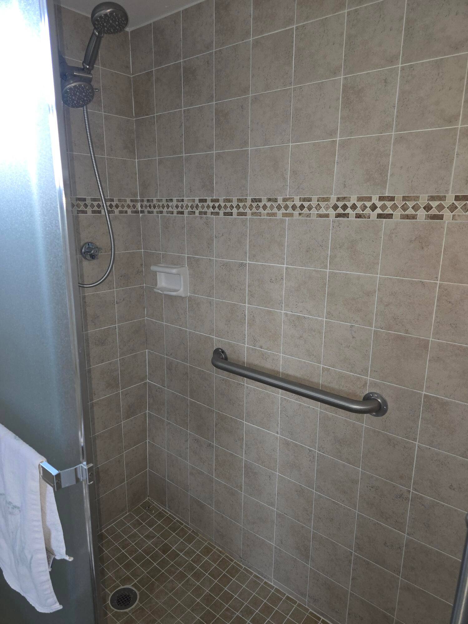Step into this bright and inviting corner unit located in the heart of Lake Worth !