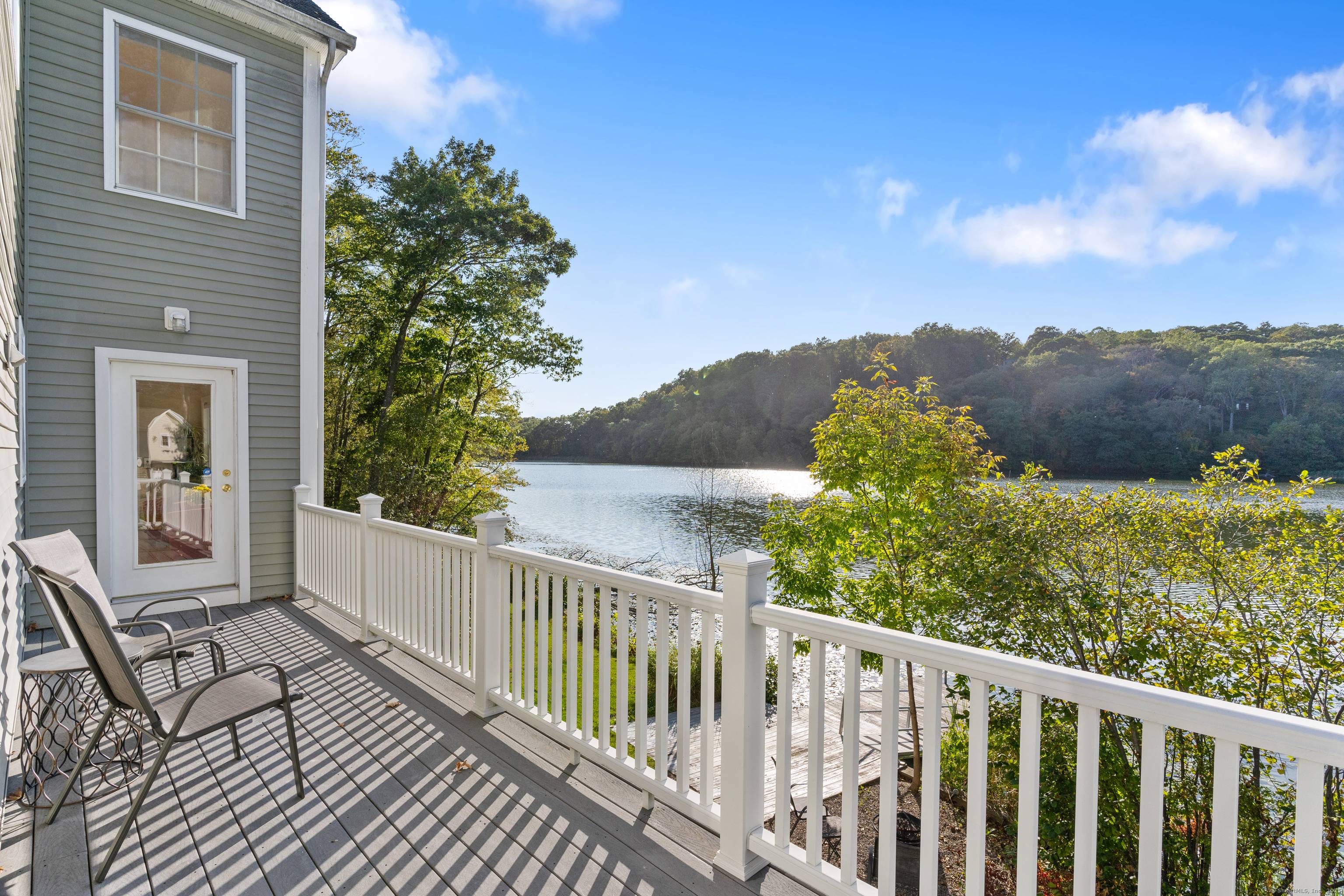 This stunning property offers a tranquil setting reminiscent of Walden Pond, showcasing breathtaking views of all four seasons.