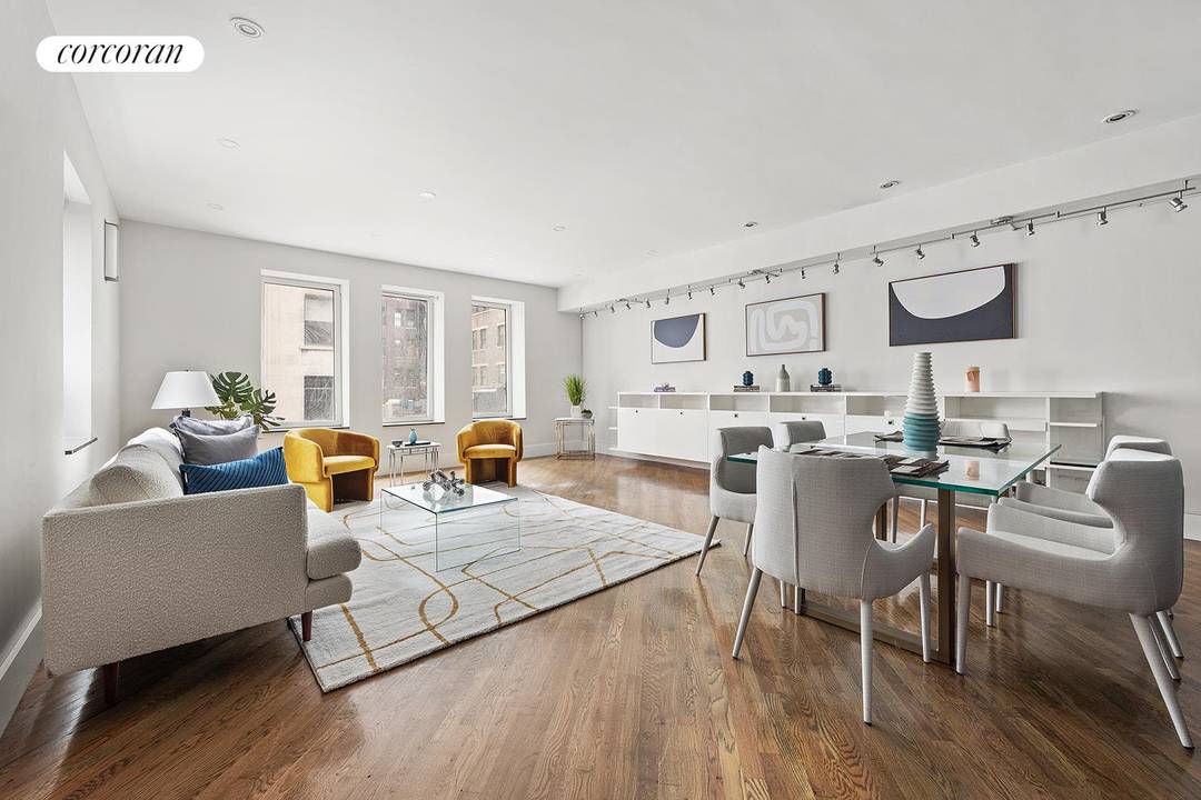 Welcome to 24 West 45th Street, Unit 8, a distinguished full floor prewar condominium residence situated in the vibrant heart of Midtown West, New York City.