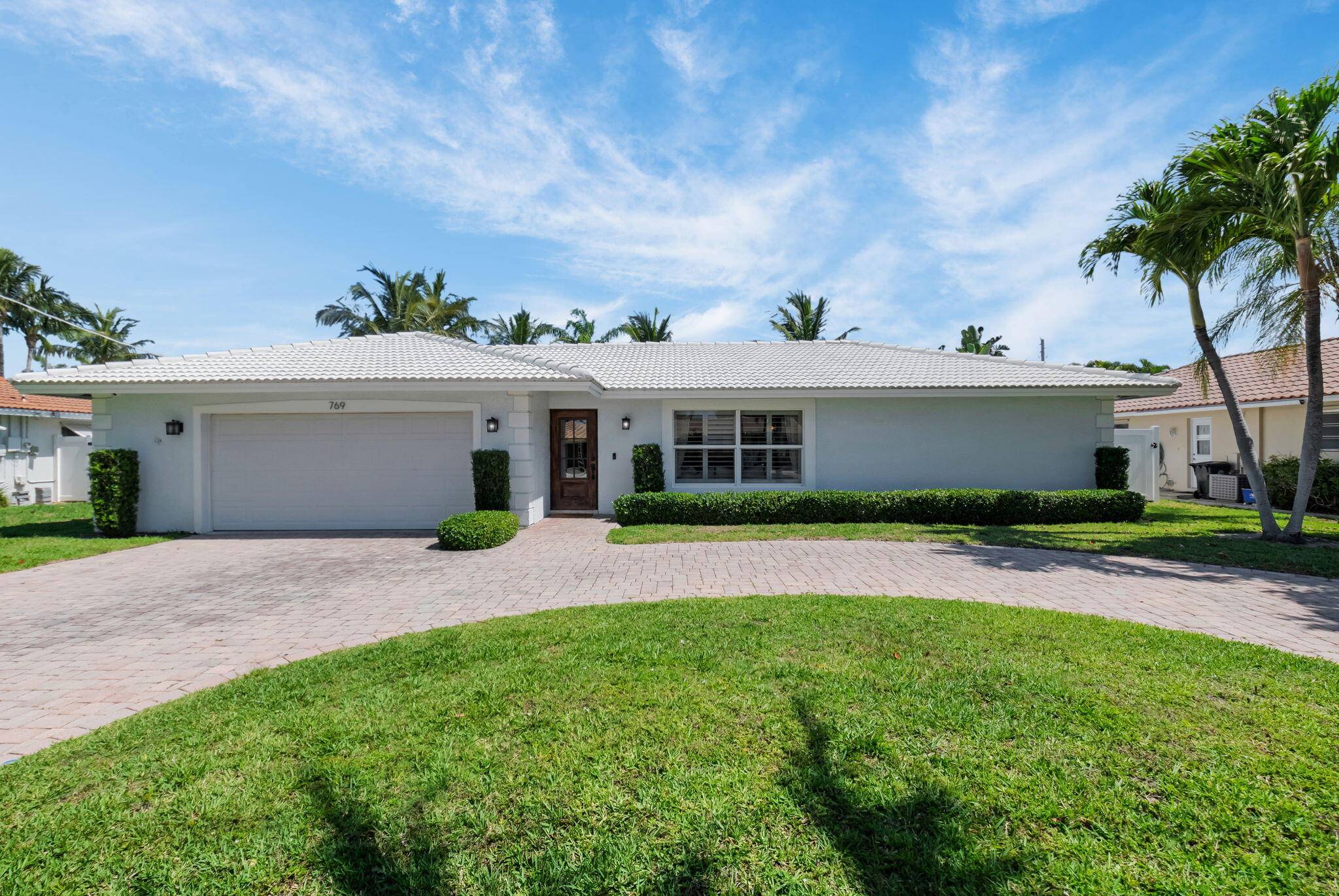Nestled on a quiet, private street in a sought after intracoastal neighborhood, this beautifully updated split floor plan home features custom California Closets, crown molding, granite countertops, and tile laminate ...