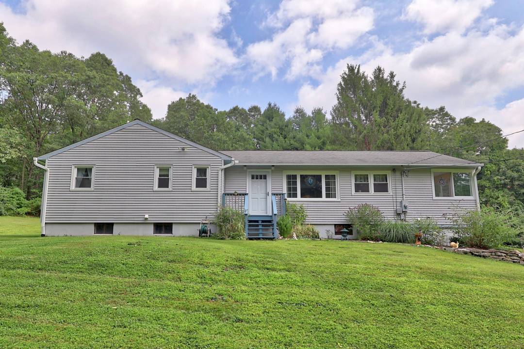 Welcome to 2 Old Turnpike Road, a classic 3 bedroom, 2 bath ranch nestled on 2.