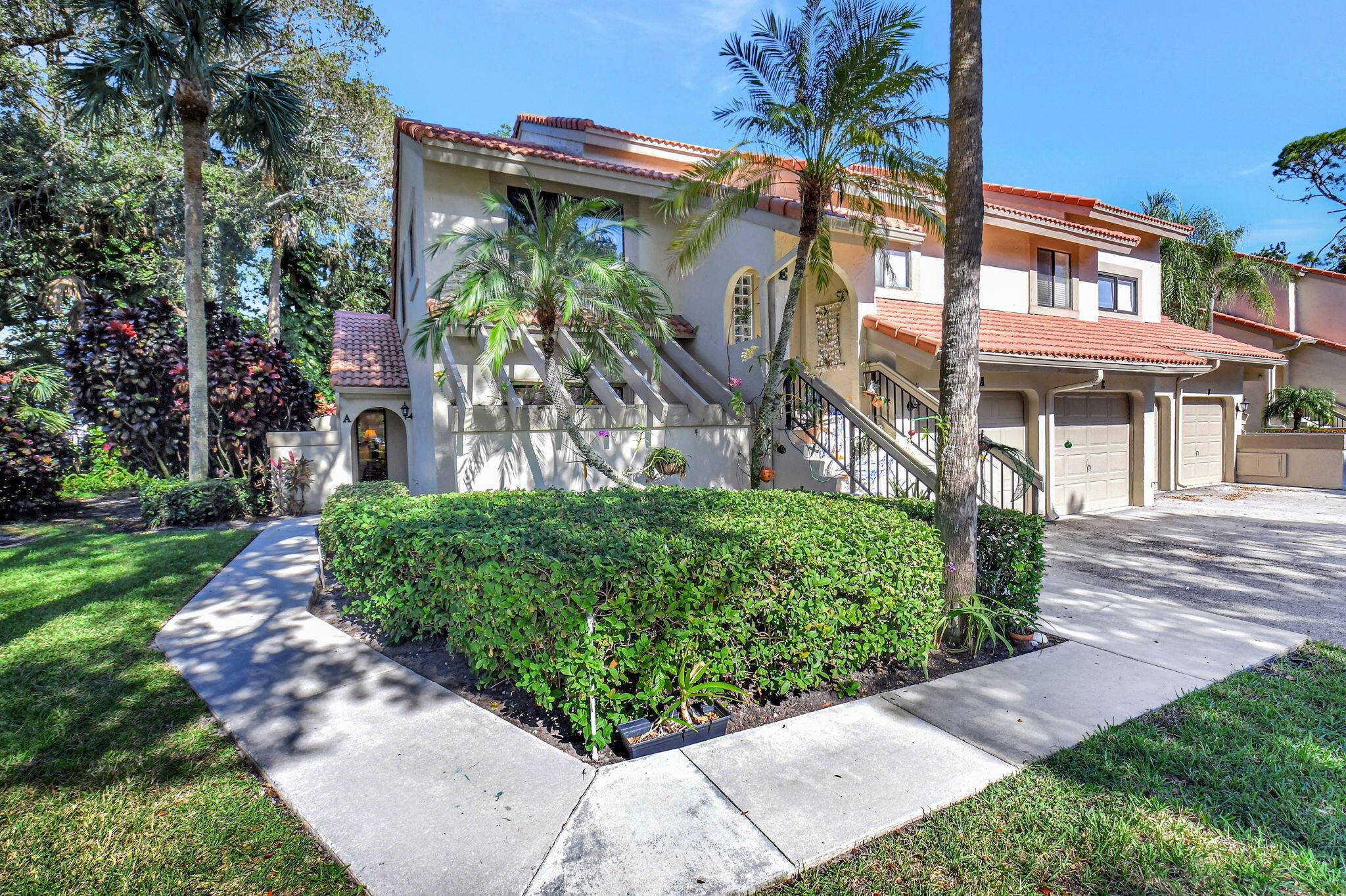 Rarely available first floor corner unit on a quiet private preserve setting.