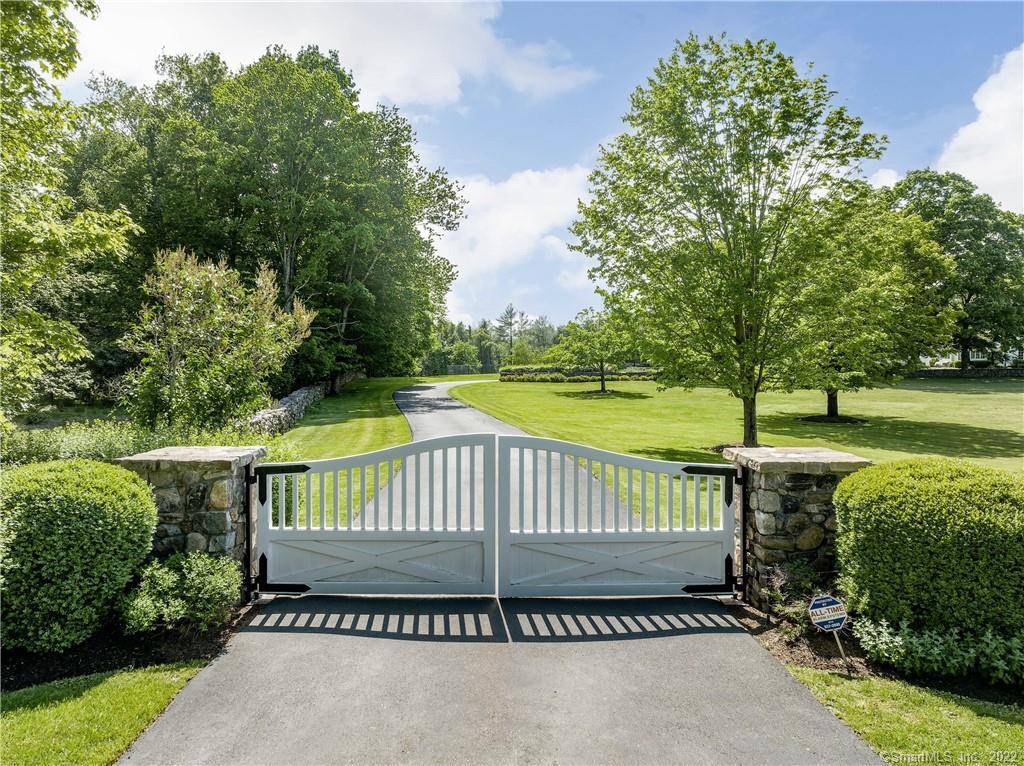 Welcome to 229 Umpawaug Road, the quintessential estate of exceptional quality on the premier scenic road in Redding, Connecticut in Fairfield County.