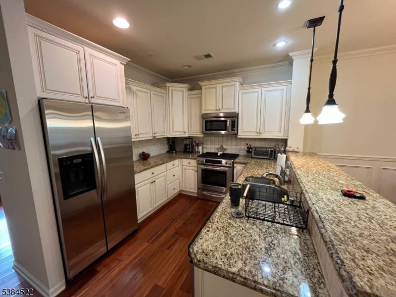 Located in the heart of Butler, this luxurious 2 bedroom townhome spans 3 stories of living space with abundant natural light.