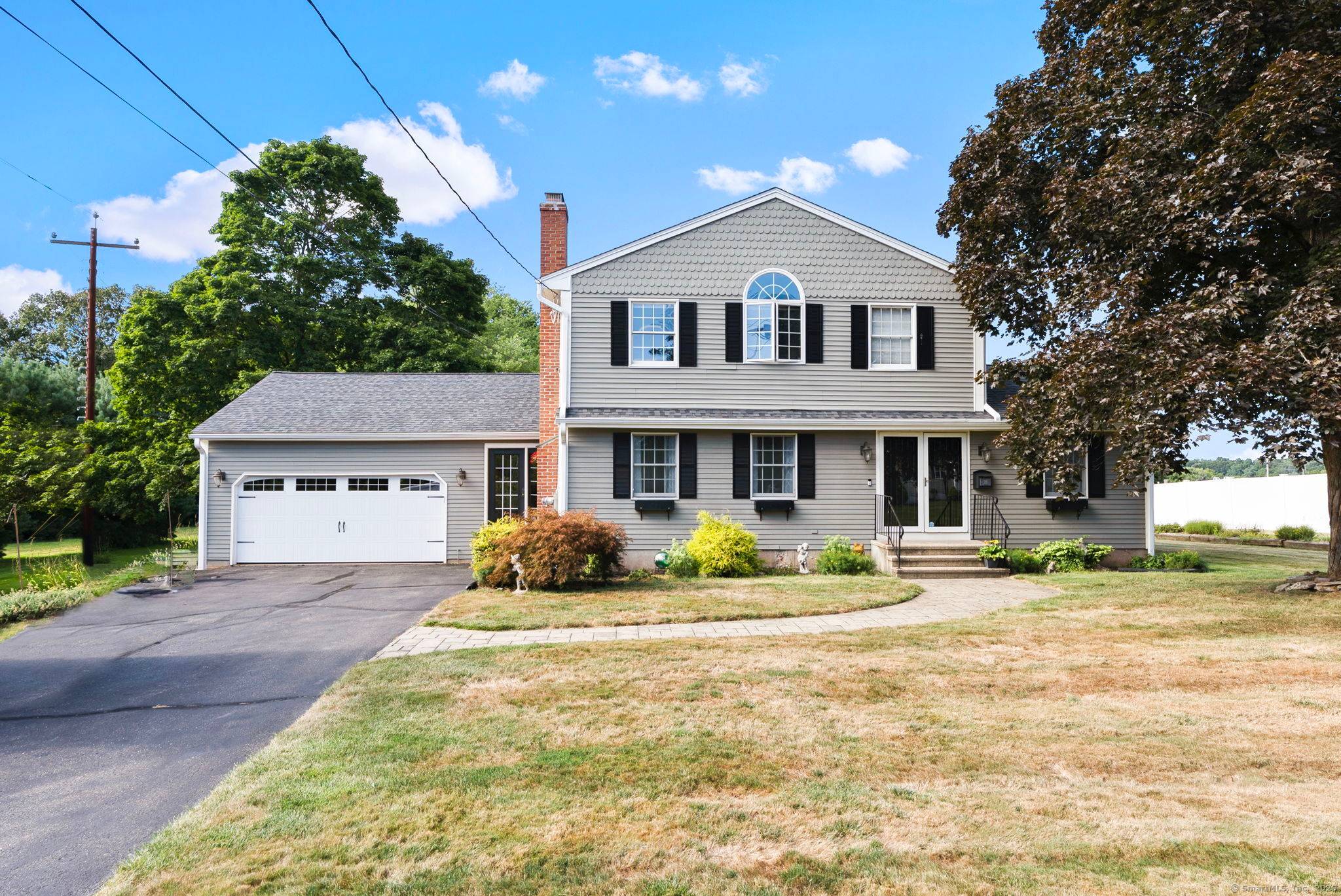Welcome to this beautifully remodeled Colonial, thoughtfully updated for modern family living.
