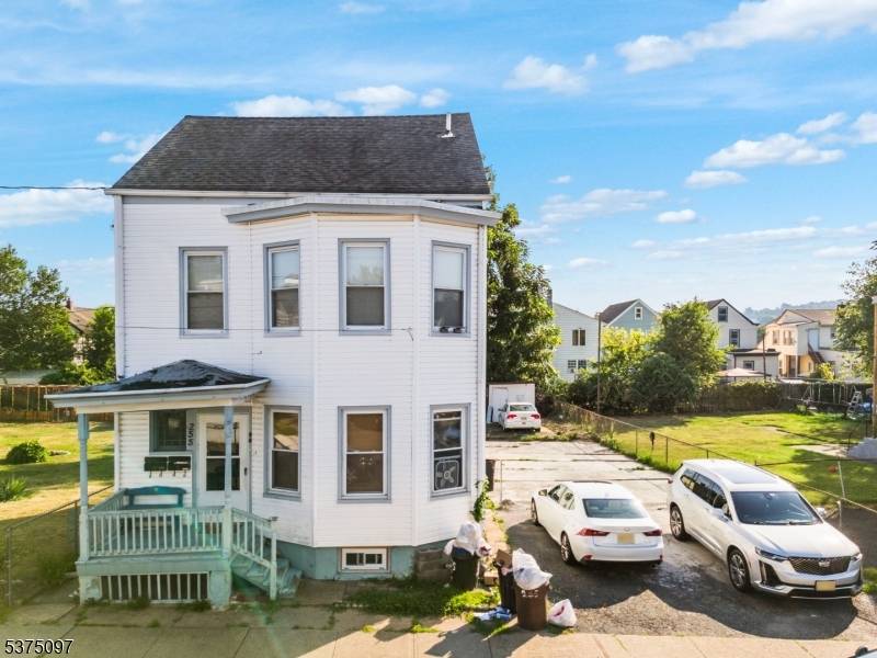 Amazing opportunity to own a spacious 2 family home featuring 5 bedrooms, 3 full bathrooms, and a fully finished basement perfect for extended living or rental income.