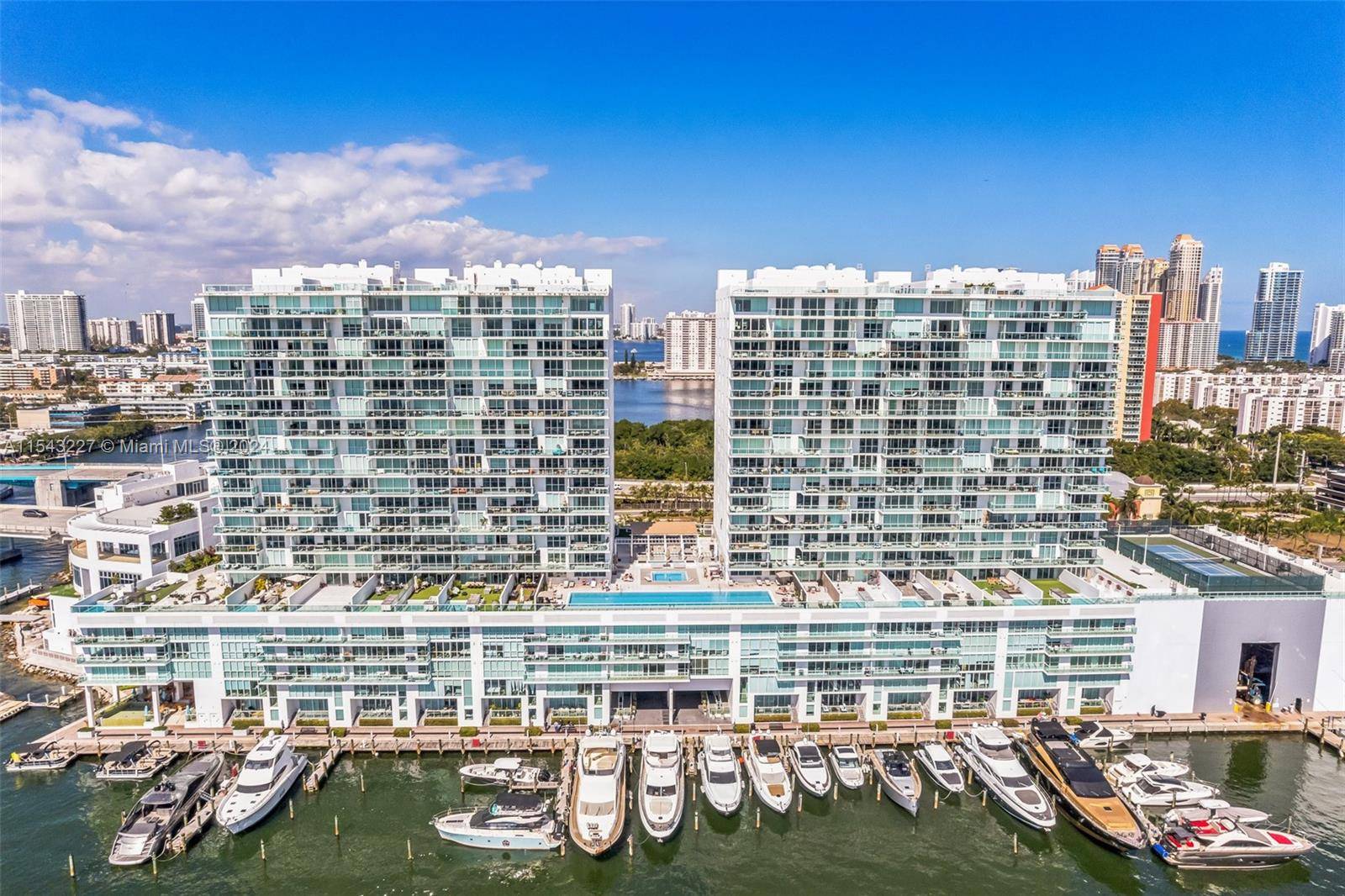 Indulge in the epitome of waterfront living with this stunning 2 Bed Den 3 Bath two story unit in the coveted 400 Sunny Isles community.