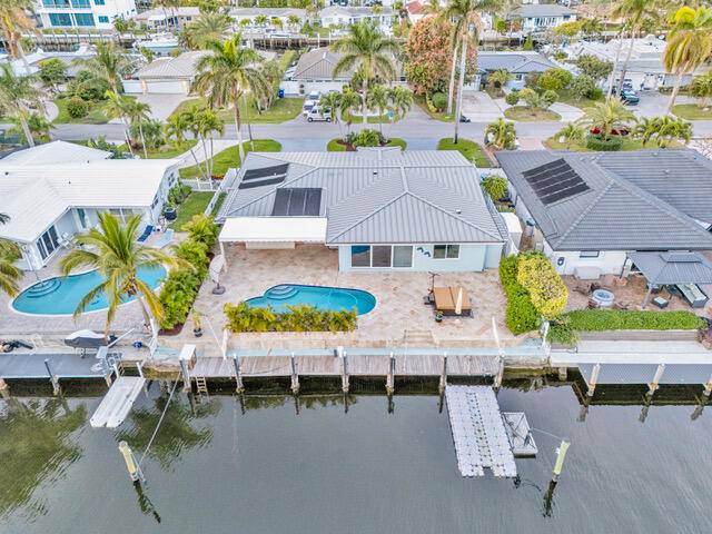 Live the waterfront dream in Pompano Beach's coveted Harbor Village !