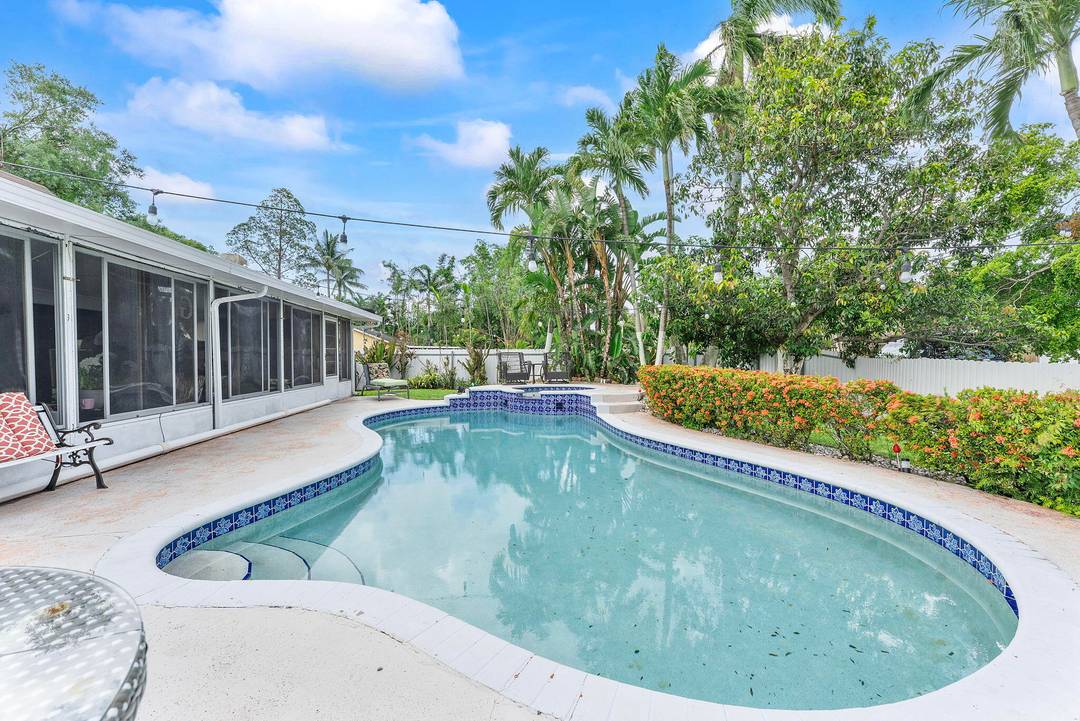 WATERFRONT POOL CORNER LOT IN LAW SUITE LAKE DECK NO HOA This UNIQUE PROPERTY has it all and offers the perfect blend of comfort, versatility, and location, ideal as an ...