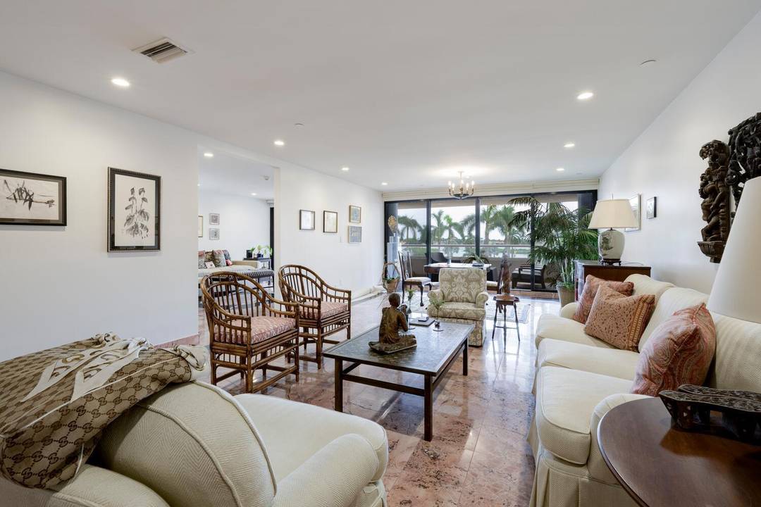 Lovely water views from this elegantly updated one story townhouse with over 3, 325 total sq.