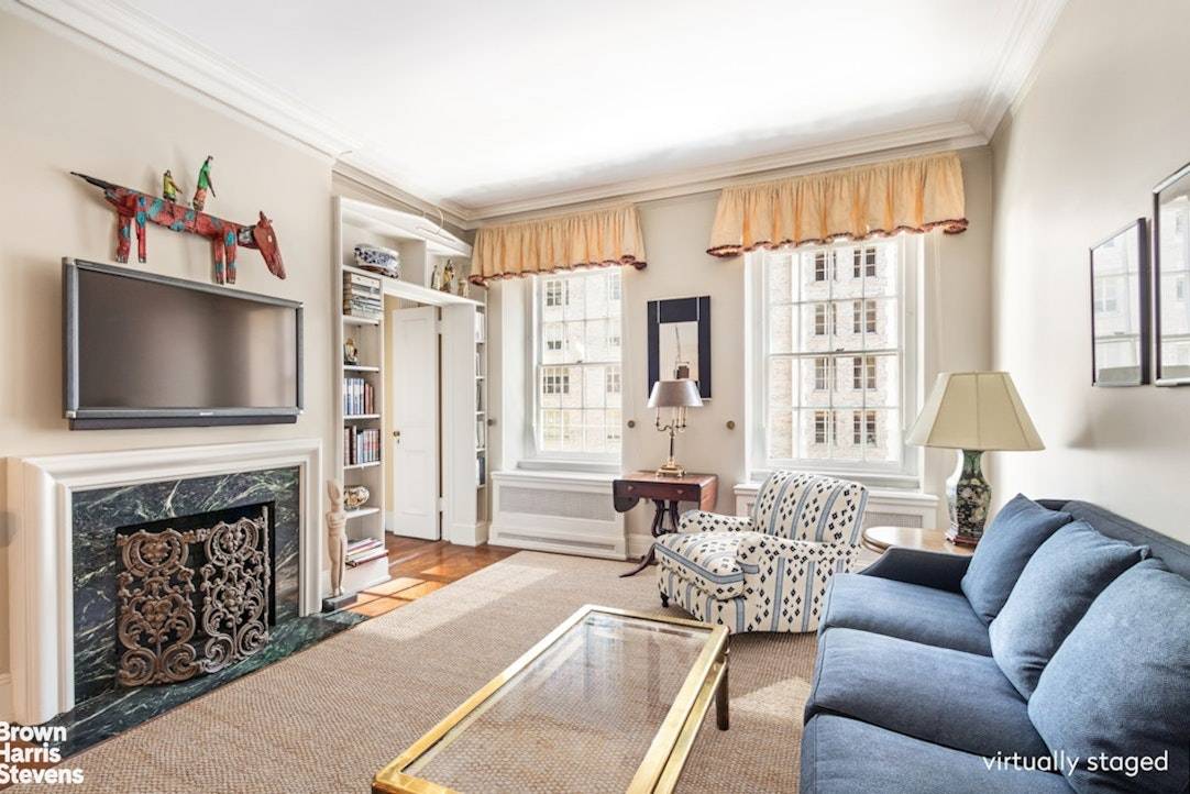 Welcome to 136 East 79th Street, Unit 7A, a stunning and generously sized pre war cooperative located in the heart of the Upper East Side.