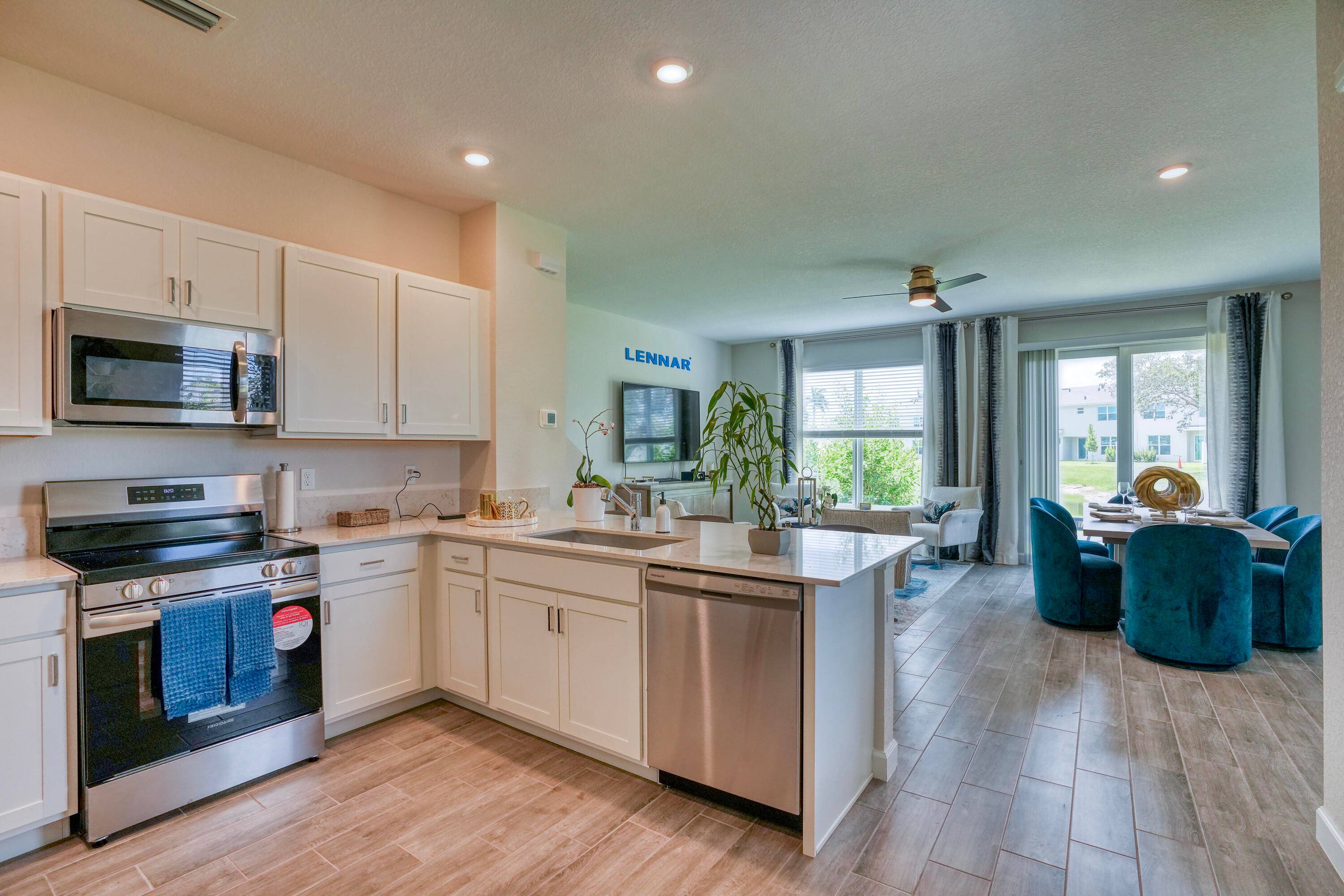 A two story townhome featuring a cohesive design that's perfect for family style living.