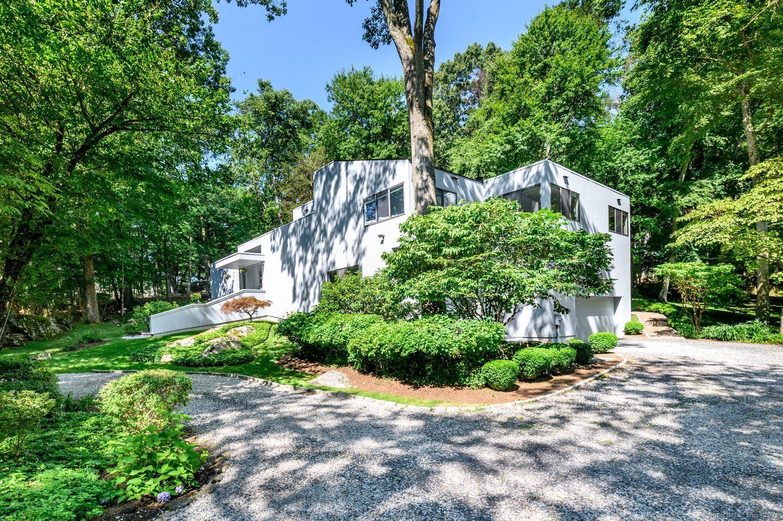 Well maintained contemporary with a mid century modern flair !