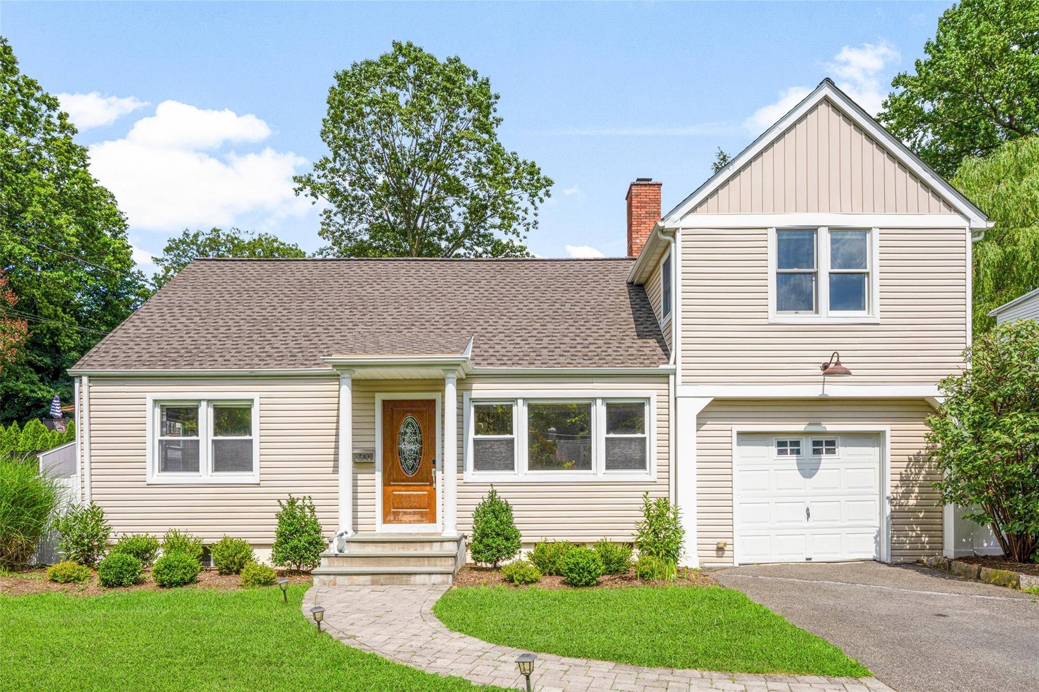 Beautifully renovated and move in ready four bedroom, three bath home in the desirable neighborhood of Harbor Heights in the Village of Mamaroneck.