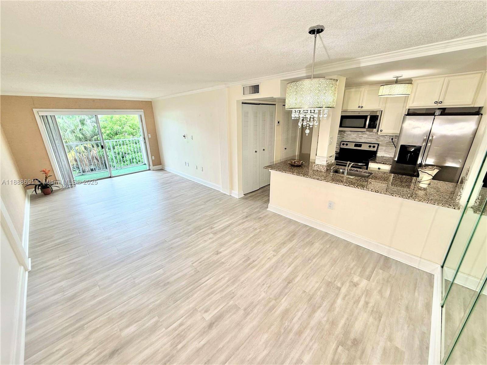 Stylish 2BD 2BA corner condo in one of Miami s most desirable areas !