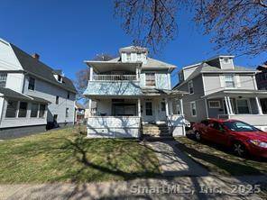 Discover the investment potential of this elegant two family home at 141 Center Street in West Haven.