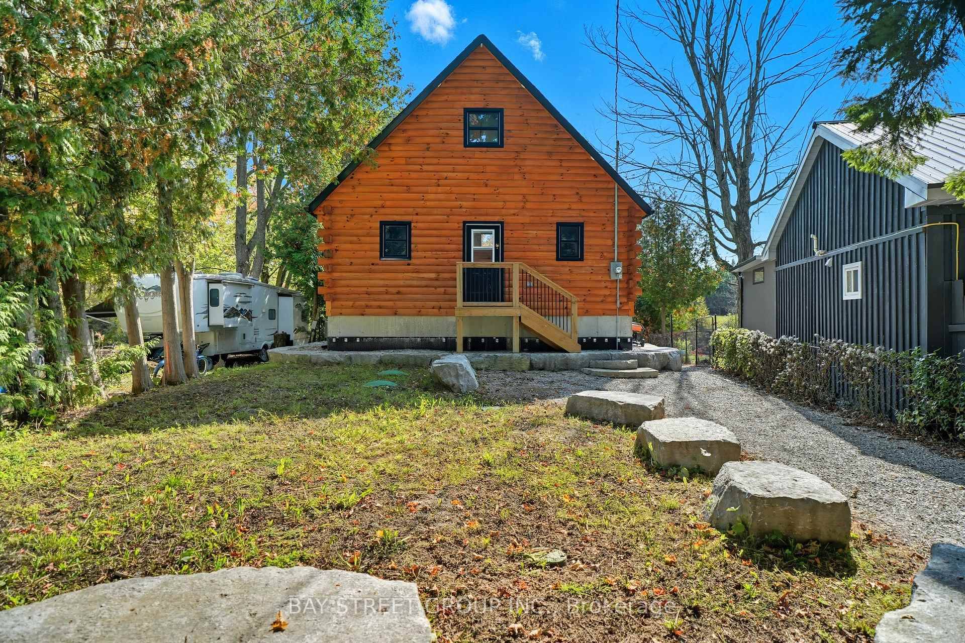 Discover the Ultimate in Waterfront living with this Rare Log home, a style prized for its Soaring Ceilings, Striking Angular roofline, and unparalleled architectural character properties like this are extremely ...