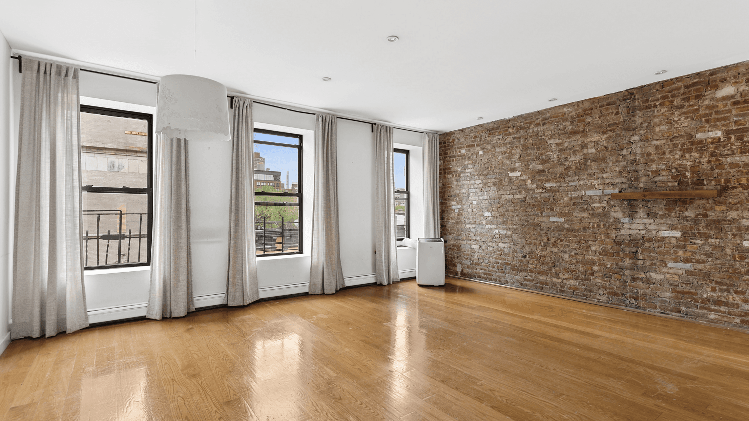This lovely top floor two bedroom, plus office space, is a rare beauty !