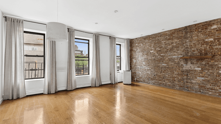 This lovely top floor two bedroom, plus office space, is a rare beauty !