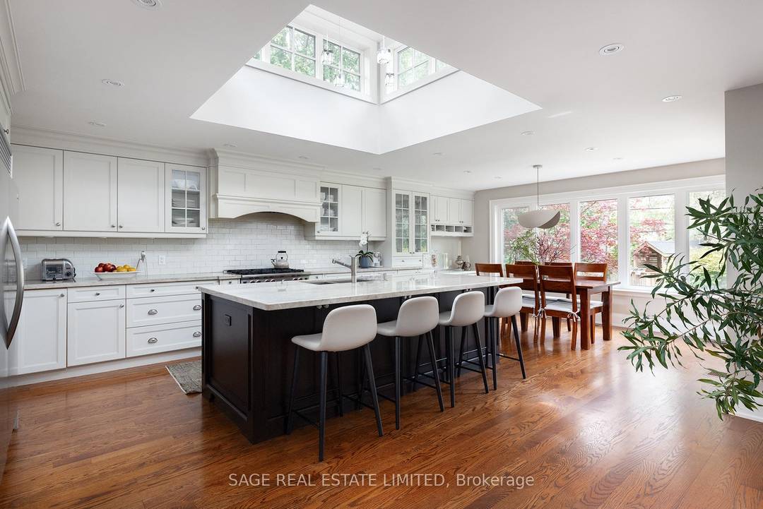 Nestled just moments from the vibrant Shops of Don Mills, this magnificent detached home combines timeless elegance with modern luxury.