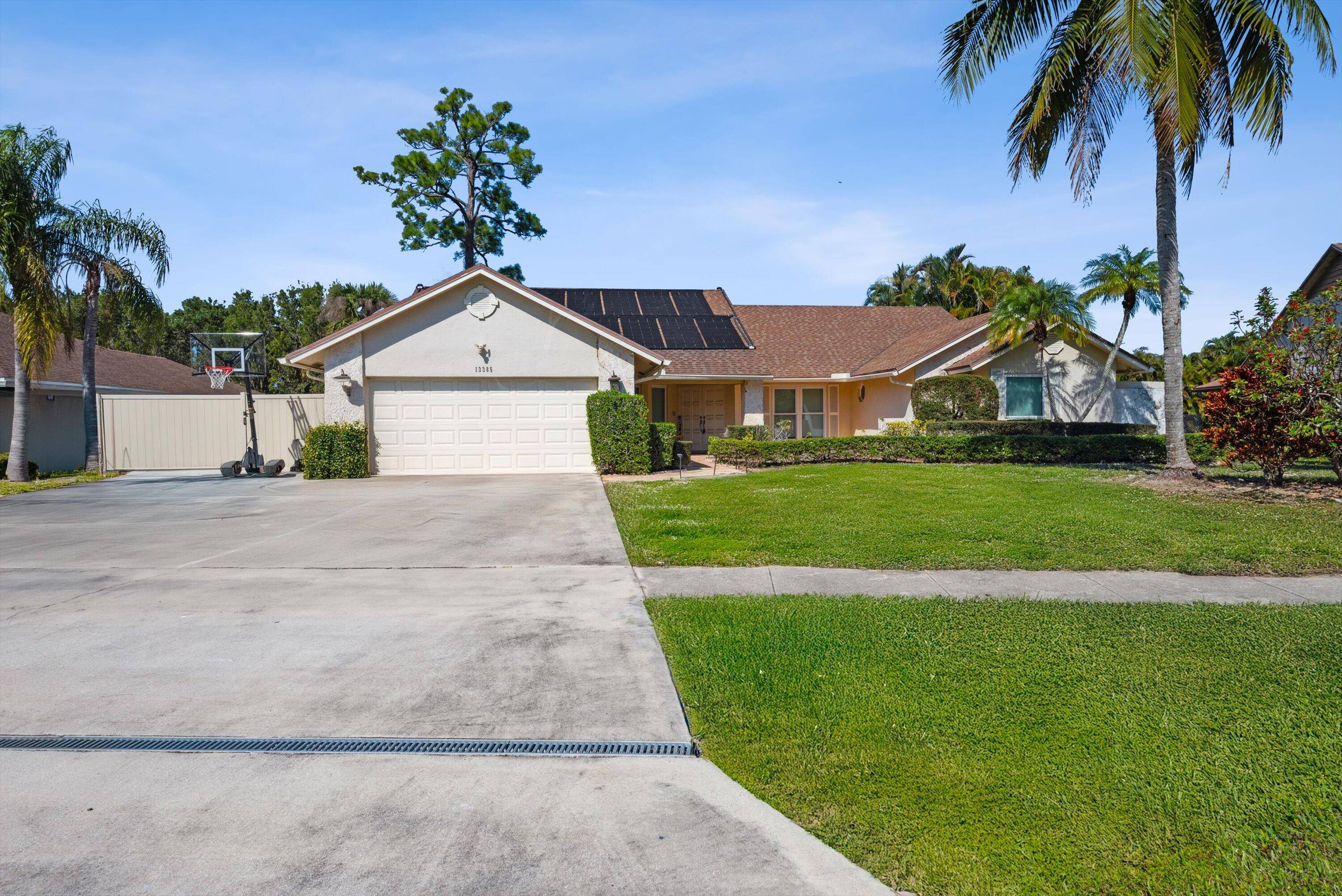 Welcome to your dream home without HOA in the heart of Wellington, Florida !