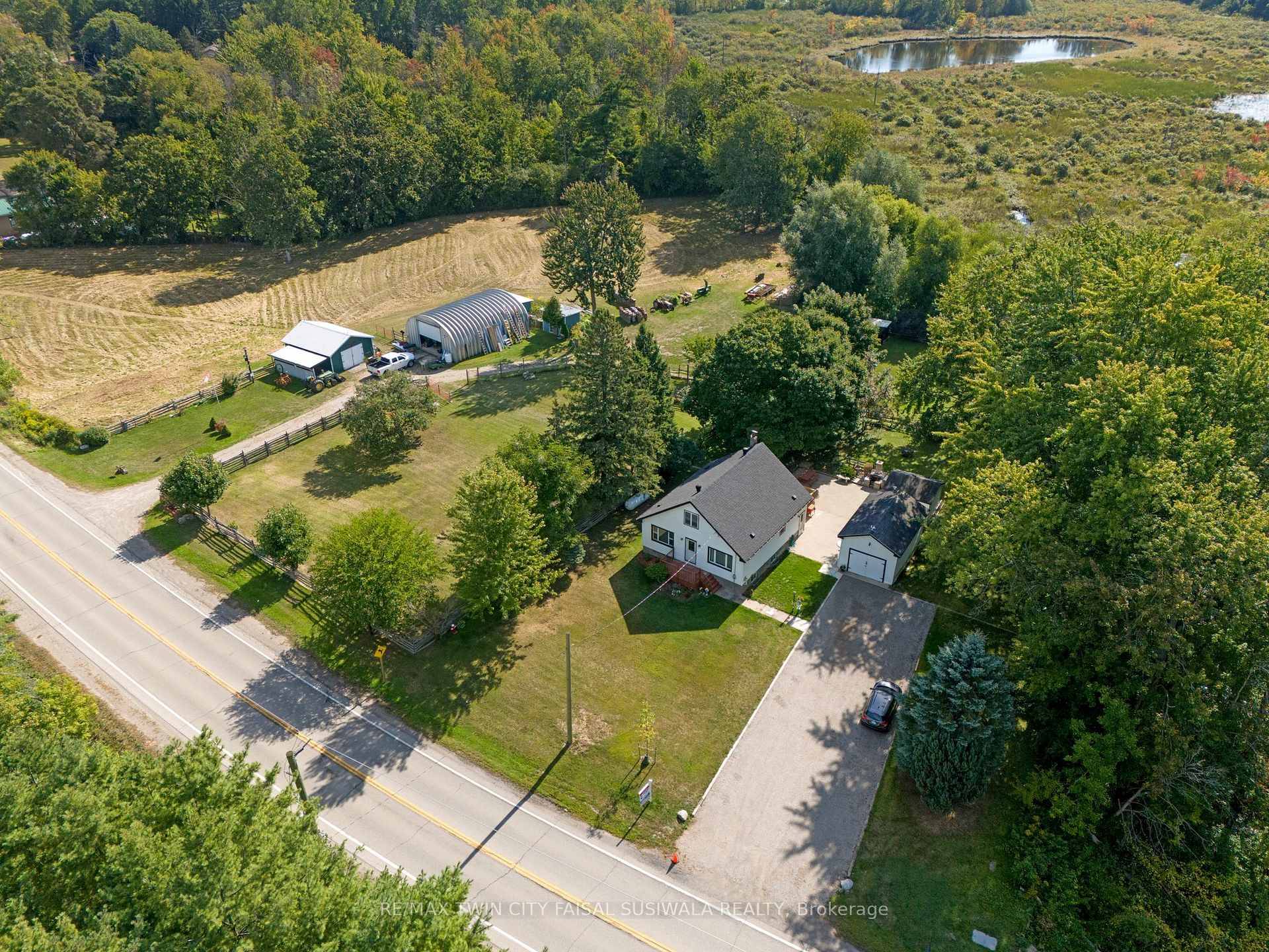 COUNTRY RETREAT WITH ACREAGE amp ; OUTBUILDINGS.