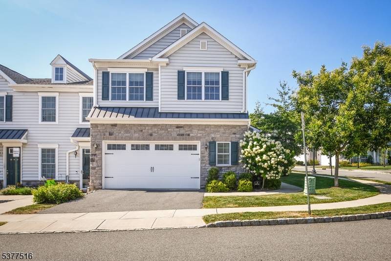 Impeccably presented 3 BR CLEMSON model townhome end unit features top of the line finishes tasteful upgrades, high ceilings, hw floors, plantation shutters and much more !