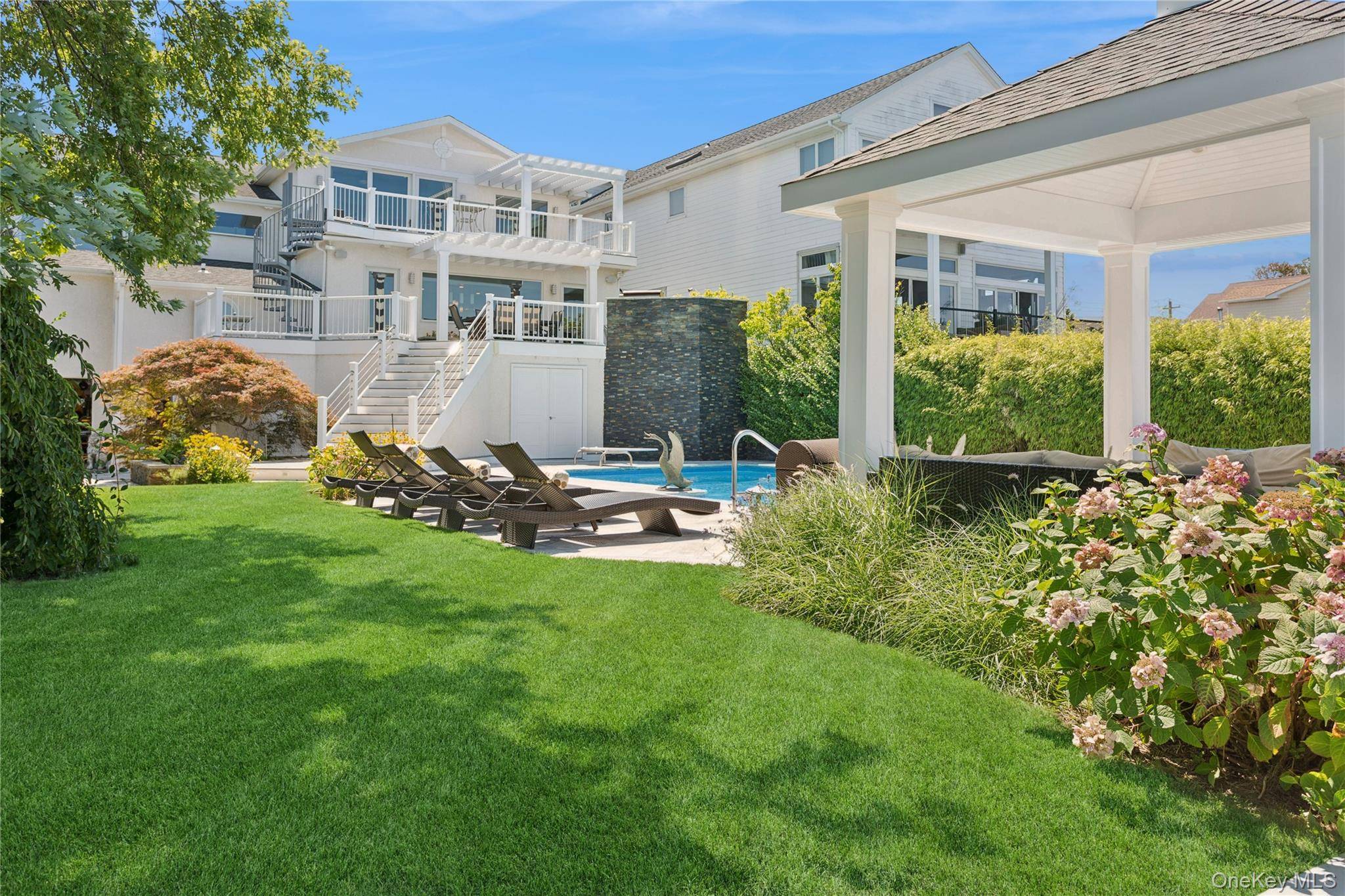 Contemporary Coastal Bayfront Retreat over looking bird sanctuary.