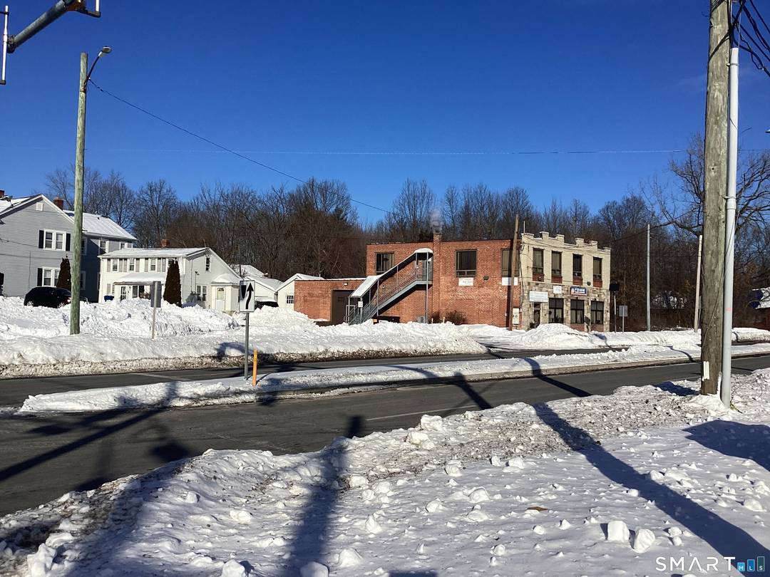 This property has a hair solan on the second floor along with two office spaces and rest room.