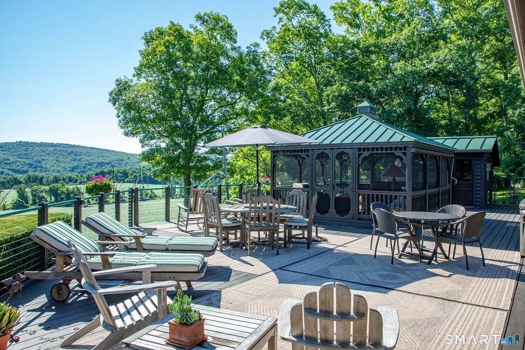 Experience this stunning sanctuary where rustic charm meets modern luxury on over 19 meticulously manicured acres of pure magic !