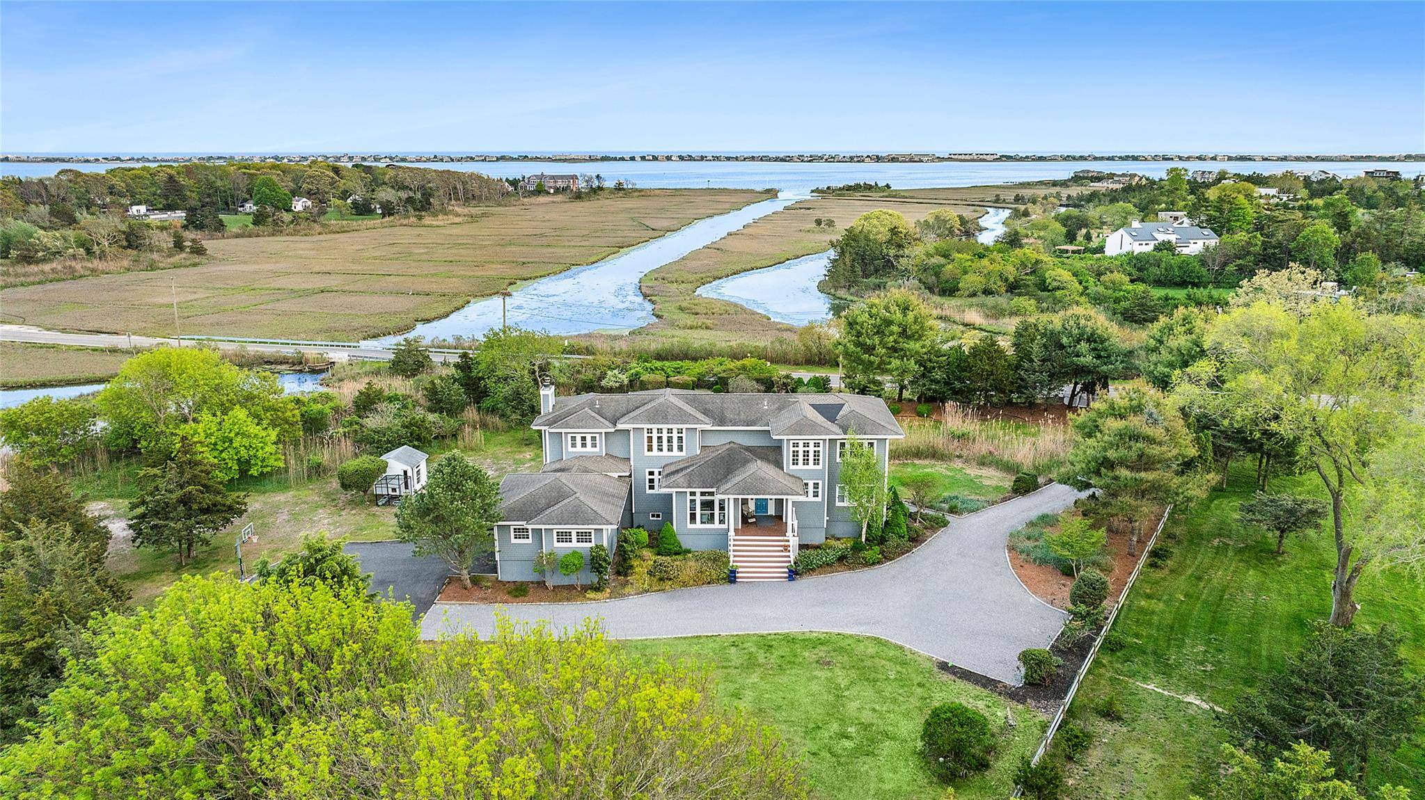 Nestled on 1. 05 acres with access to Tanners Neck Creek and bordering a nature reserve, this 5 bedroom, 3.