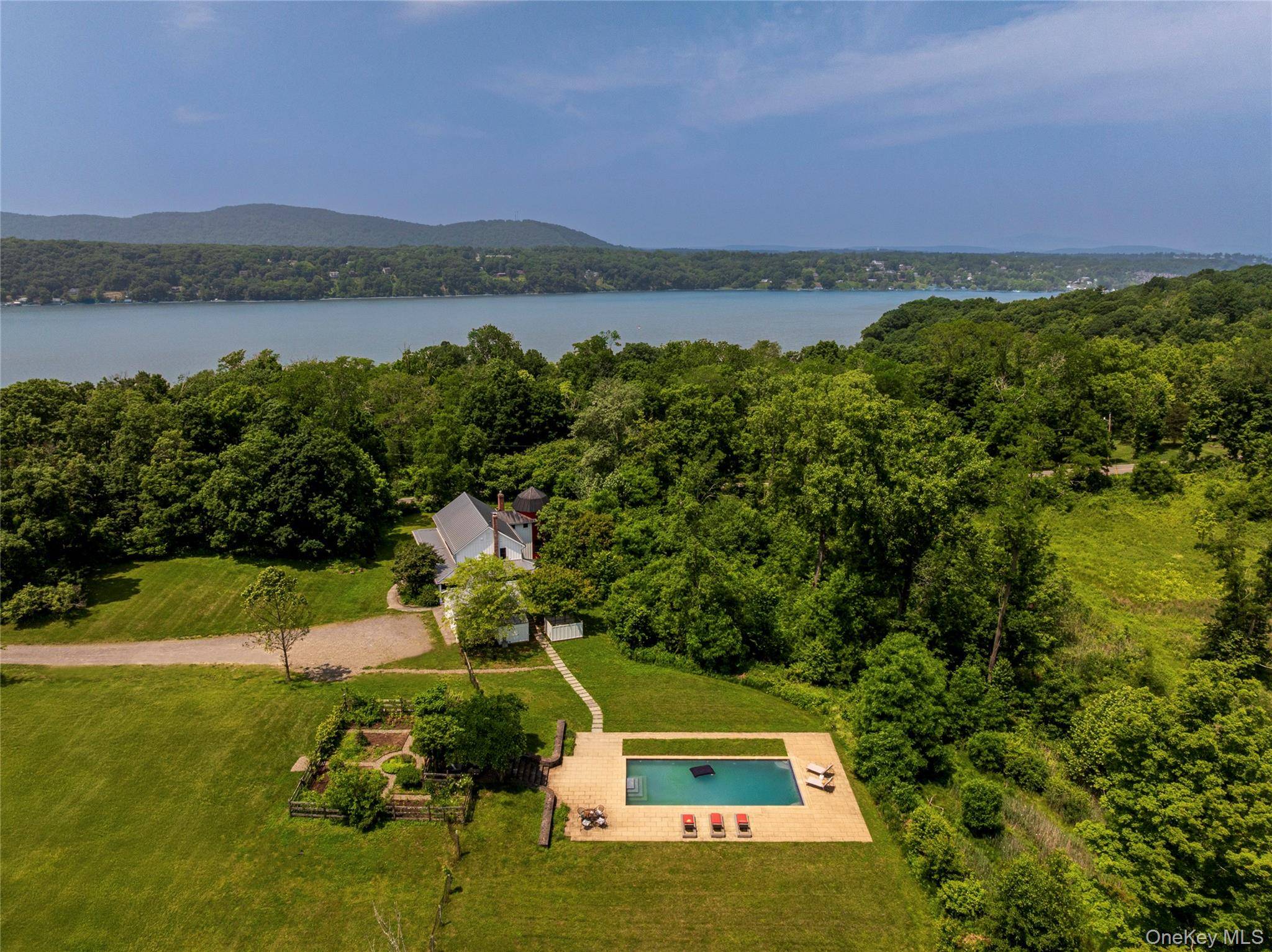 Rhinebeck Luxury Farmhouse Rental Experience timeless elegance and modern comfort at this exceptional four bedroom solar powered farmhouse, set on over five private acres adjacent to an historical Hudson River ...