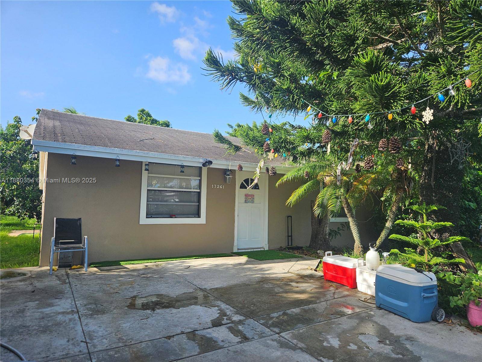 Charming home on large lot in quiet neighborhood with mature fruit trees.