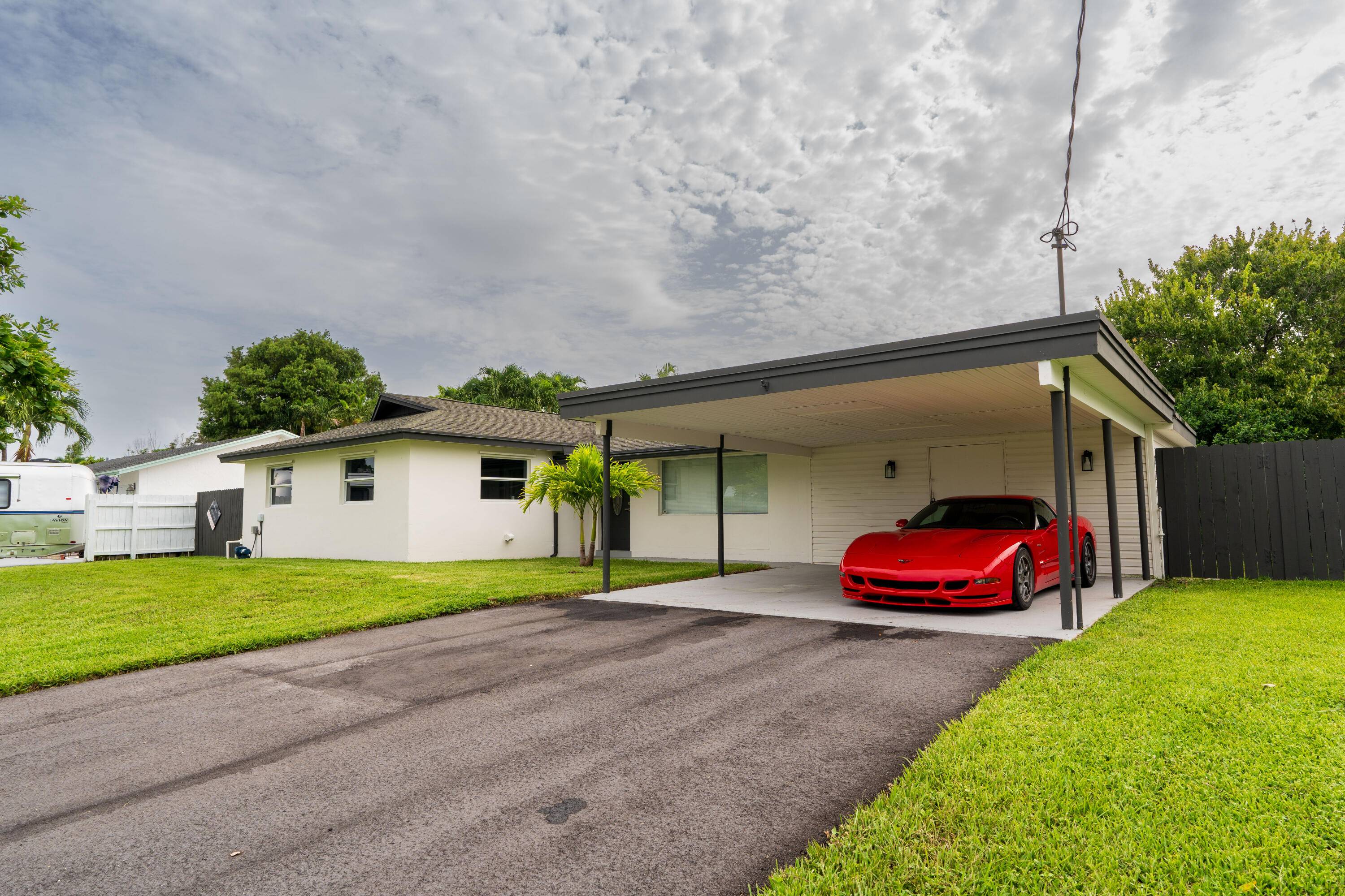 Experience the epitome of luxury living at its finest in this remarkable waterfront property in prestigious Palm Beach county.