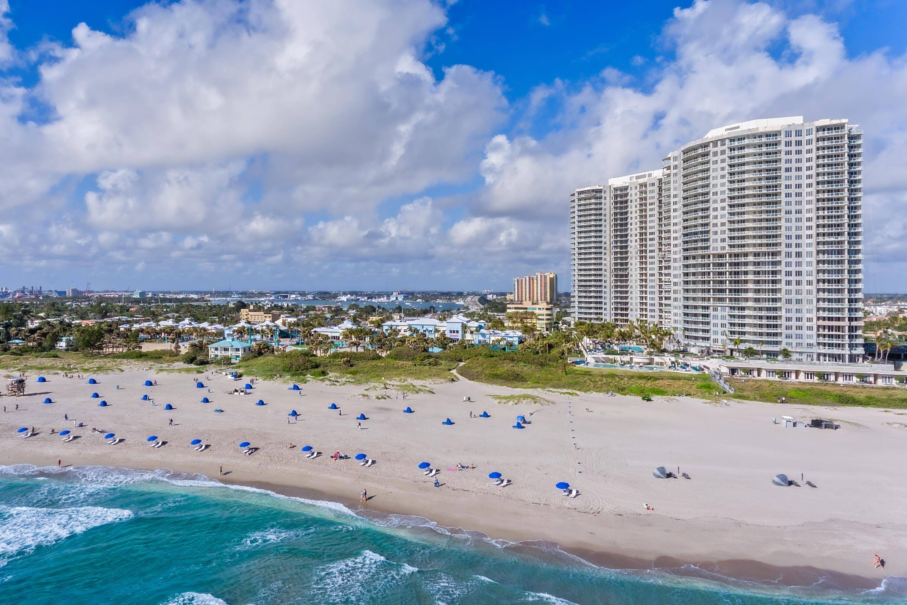 Welcome to a luxurious beachfront oasis located directly on the sands of Singer Island.