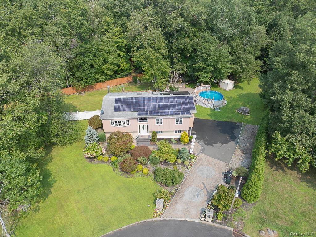 Experience the epitome of luxury and tranquility at 10 Green Bower Lane, a unique opportunity to own a beautiful home nestled on almost an acre of land in a private ...