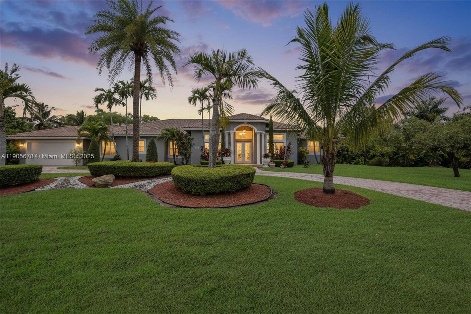 Welcome to this exceptional one story home in Southwest Ranches, set on a spacious builder s acre lot.