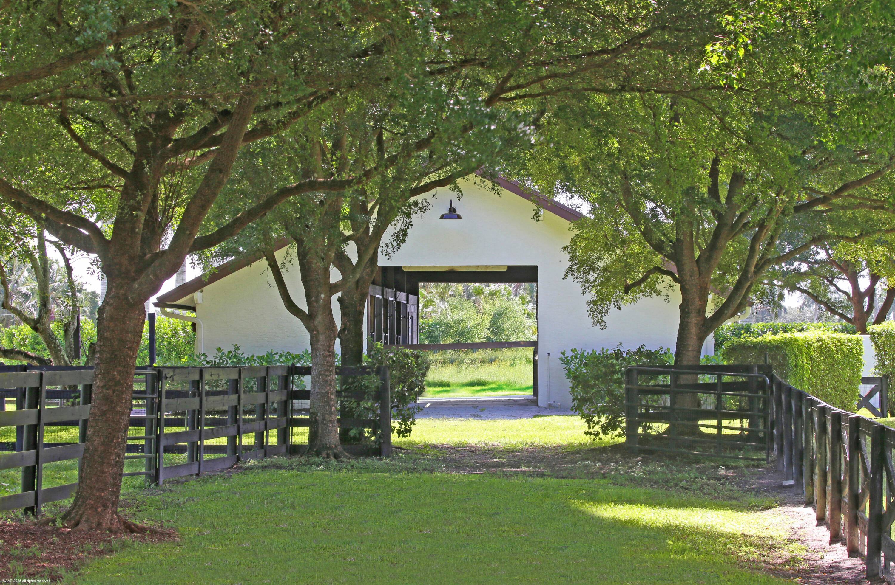 Located within the gates of Palm Beach Point, this is one of the most picturesque 5 acre lots.