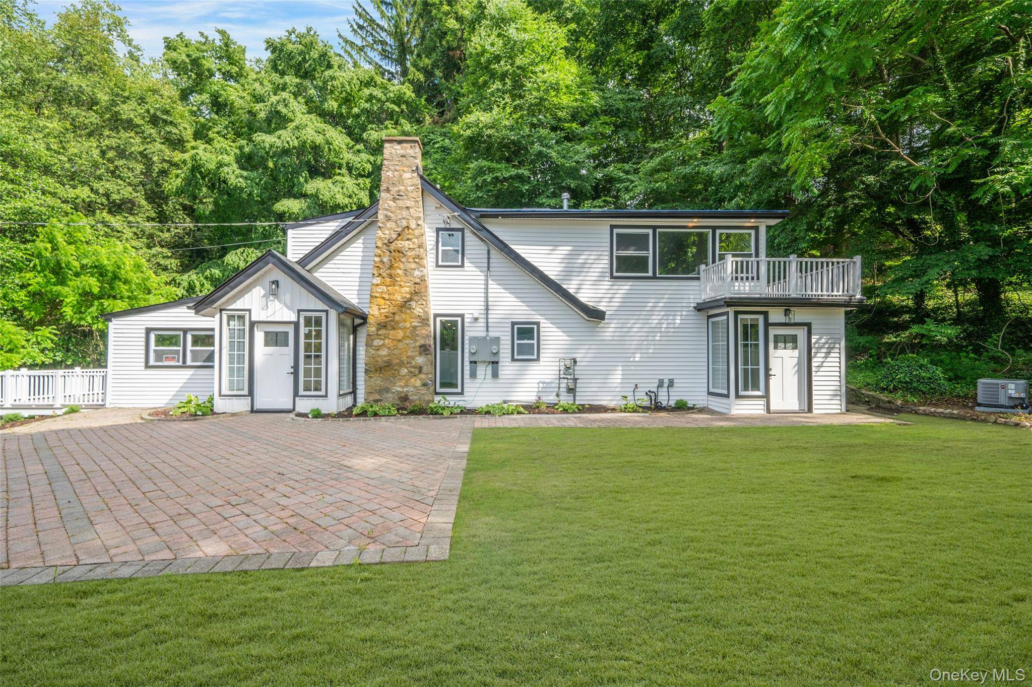 This exquisitely updated 2 story home combines modern luxury with timeless elegance featuring 4 spacious bedrooms and 5 elegantly designed bathrooms with porcelain tiles and rain shower.