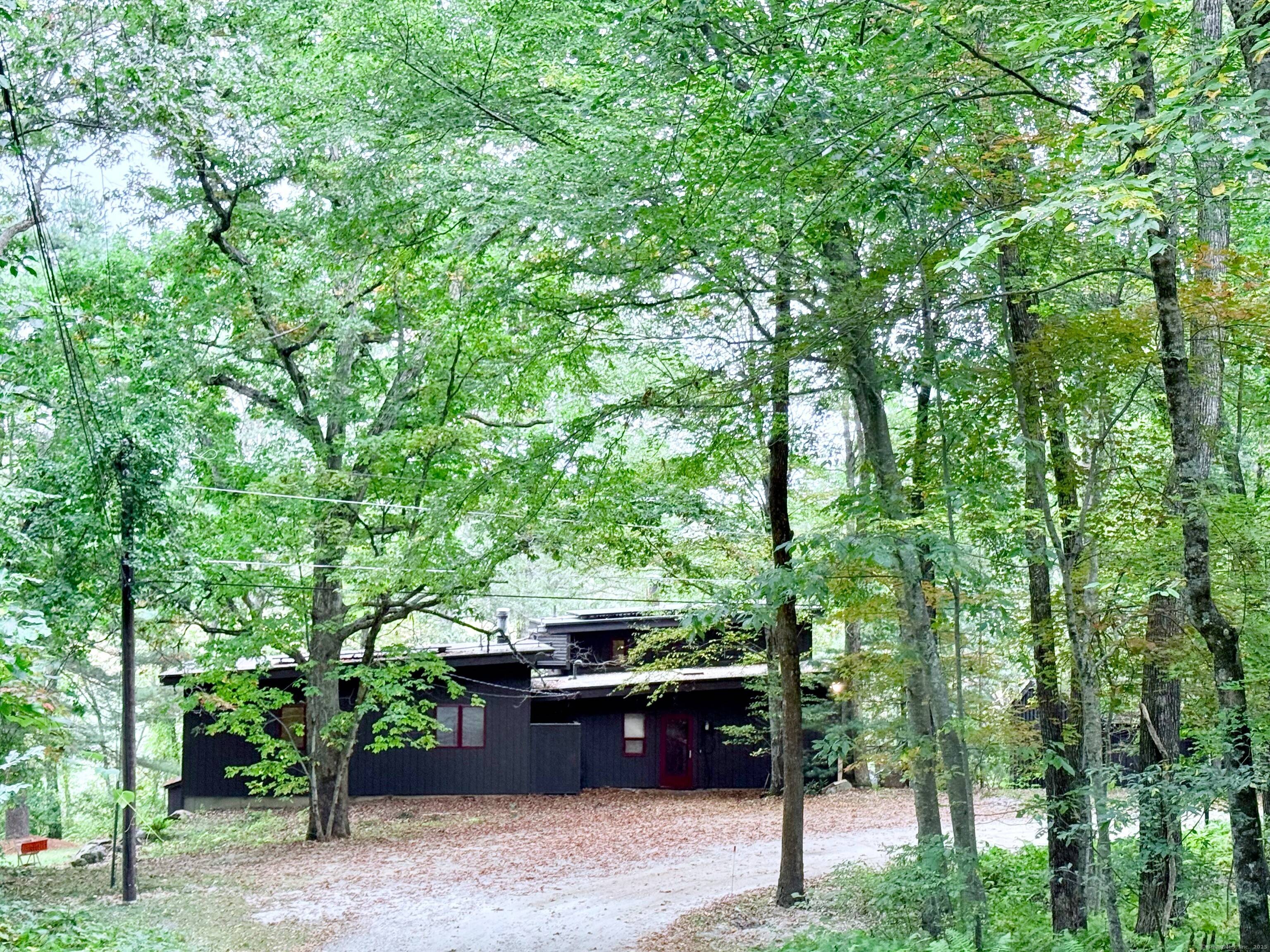 House overlooks 100 acres of town designated open space.