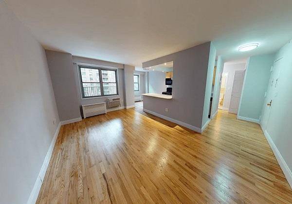 Gorgeous sun filled home features wall of south facing windows.