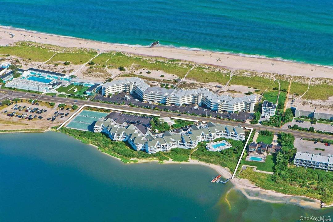 Available for July 2026. This open and bright, one bedroom, two bath condo on the top floor of the Yardarm On The Bay offers amazing bay and sunset views.