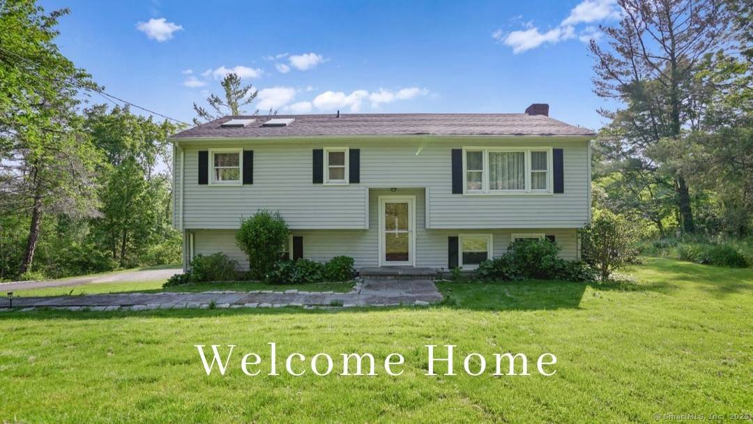 Set back from the road behind a classic stone wall, this 1, 800 sq ft raised ranch, built in 1965, offers a versatile layout and a rare opportunity to buy ...