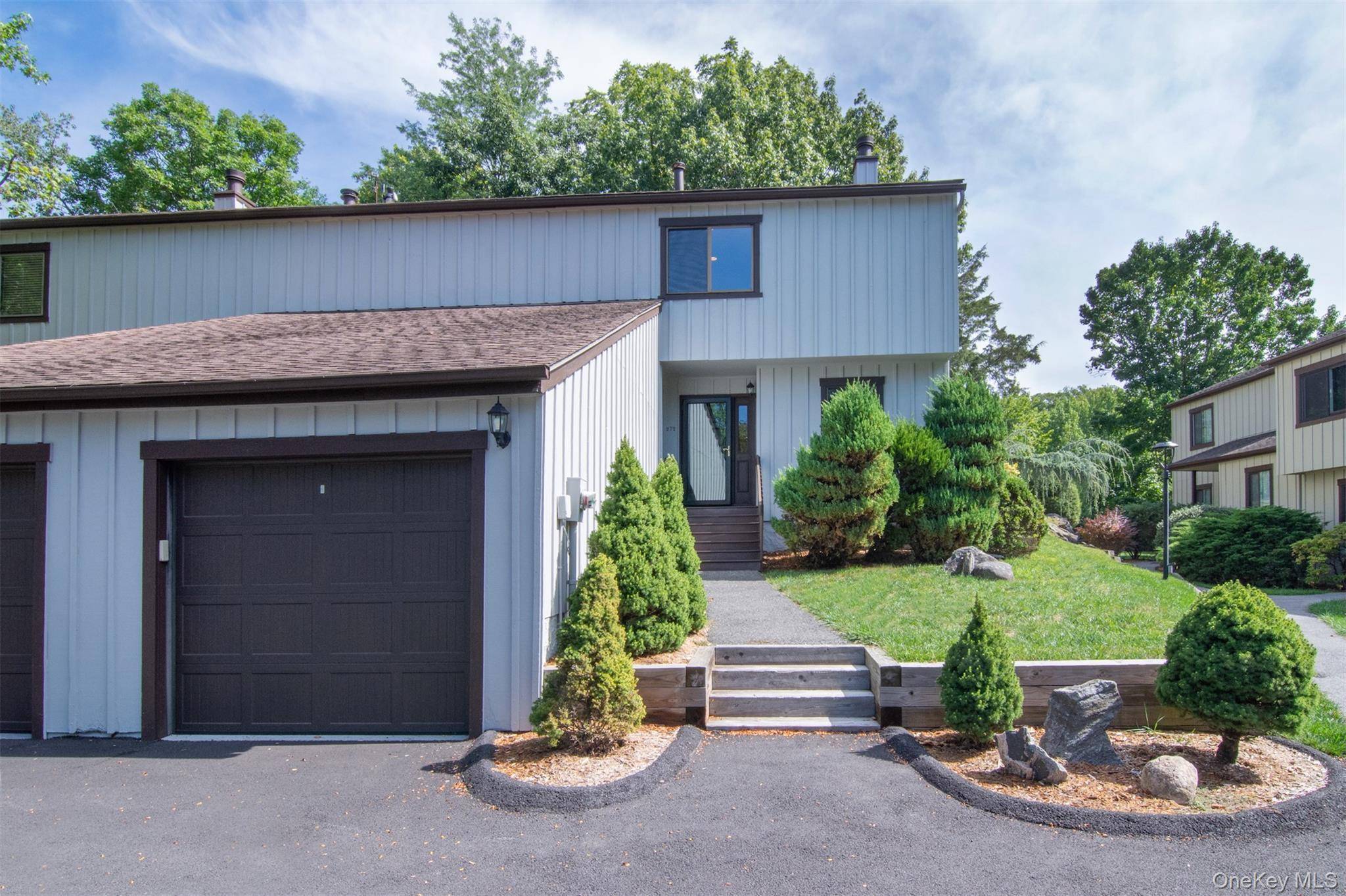 Welcome to 272 Birch Lane a beautifully designed two floor townhouse in the desirable Downingwood community of Irvington, New York.