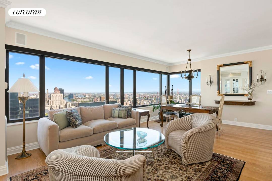 Beautifully renovated with sweeping river and city views throughout, this 42nd floor 2BR, 2.